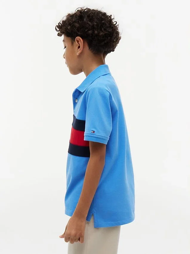 Polo elástico con bandera y bloques de color para niño Polo elástico con bandera y bloques de color para niño