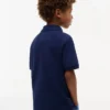 Polo elástico con bandera y bloques de color para niño Polo elástico con bandera y bloques de color para niño