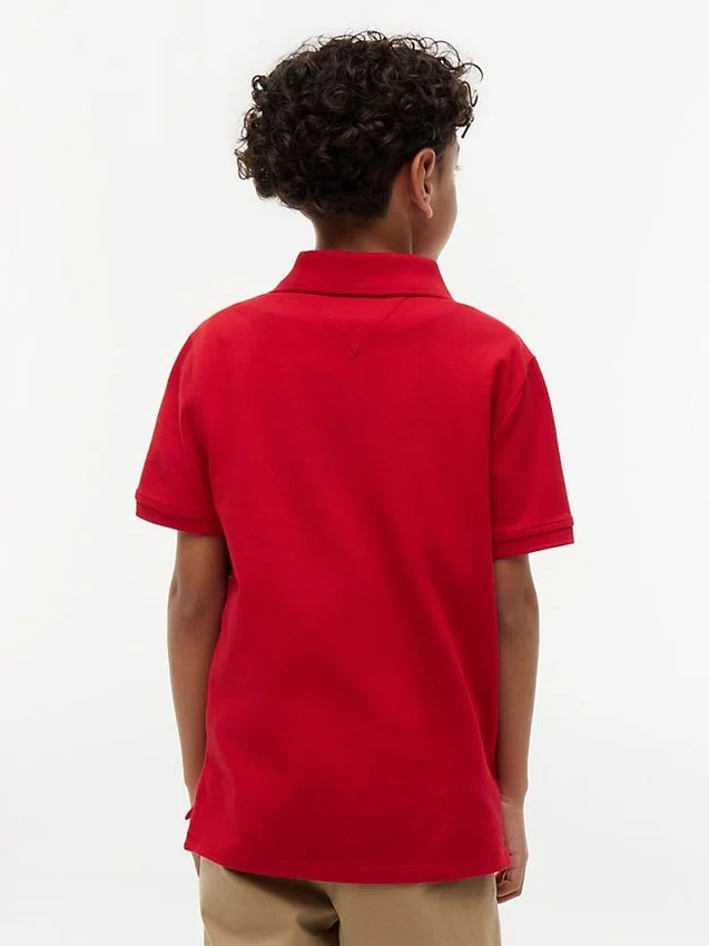 Polo elástico con bandera y bloques de color para niño Polo elástico con bandera y bloques de color para niño