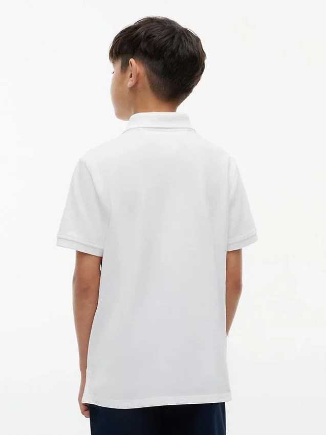 Polo elástico con bandera y bloques de color para niño Polo elástico con bandera y bloques de color para niño