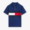 Polo elástico con bandera y bloques de color para niño Polo elástico con bandera y bloques de color para niño