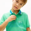 Polo elástico con el logotipo de Hilfiger para niño Polo elástico con el logotipo de Hilfiger para niño