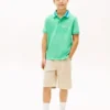 Polo elástico con el logotipo de Hilfiger para niño Polo elástico con el logotipo de Hilfiger para niño
