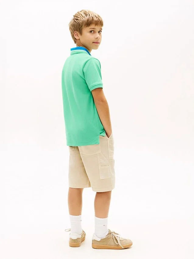 Polo elástico con el logotipo de Hilfiger para niño Polo elástico con el logotipo de Hilfiger para niño