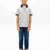 Polo elástico con estampado náutico para niño