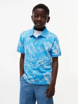 Polo elástico con estampado tropical para niño