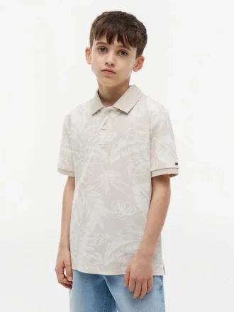 Polo elástico con estampado tropical para niño