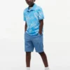 Polo elástico con estampado tropical para niño
