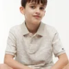 Polo elástico con estampado tropical para niño