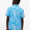 Polo elástico con estampado tropical para niño