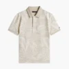 Polo elástico con estampado tropical para niño