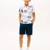 Polo elástico con logo integral para niños