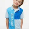 Polo elástico con logo y bloques de color para niño Polo elástico con logo y bloques de color para niño