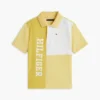 Polo elástico con logo y bloques de color para niño Polo elástico con logo y bloques de color para niño