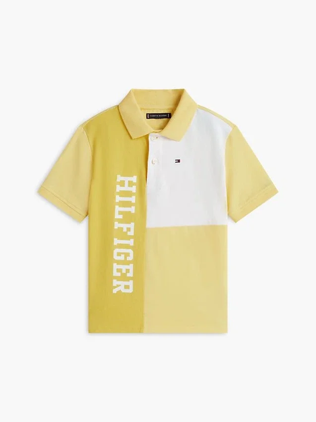 Polo elástico con logo y bloques de color para niño Polo elástico con logo y bloques de color para niño