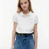 Polo elástico con mangas abullonadas para niña Polo elástico con mangas abullonadas para niña