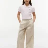 Polo elástico con mangas abullonadas para niña Polo elástico con mangas abullonadas para niña