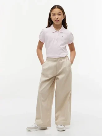 Polo elástico con mangas abullonadas para niña