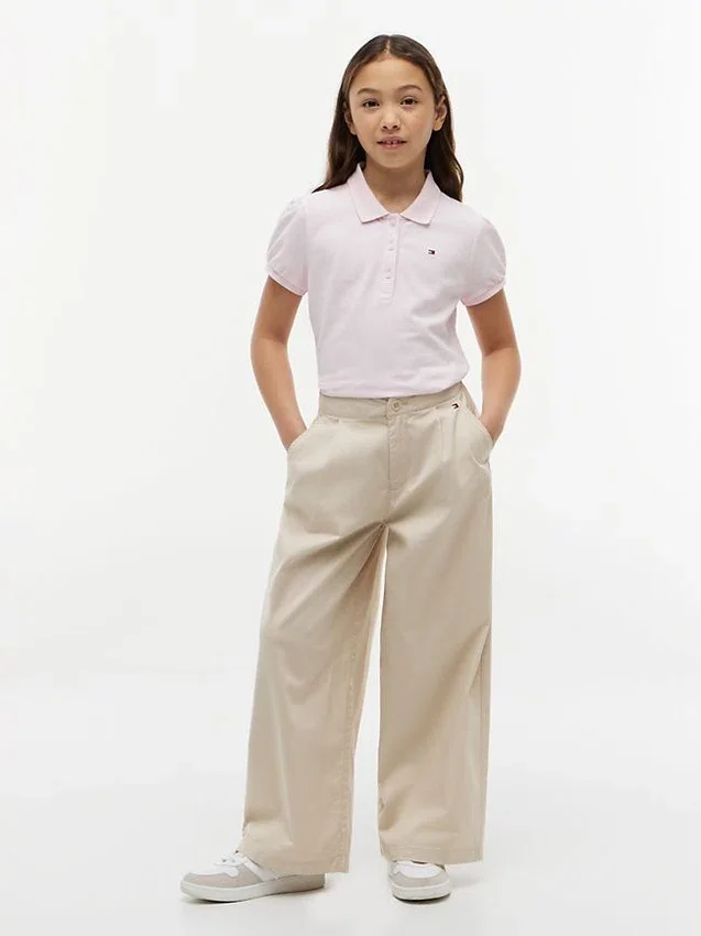 Polo elástico con mangas abullonadas para niña Polo elástico con mangas abullonadas para niña