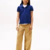 Polo elástico con mangas abullonadas para niña Polo elástico con mangas abullonadas para niña