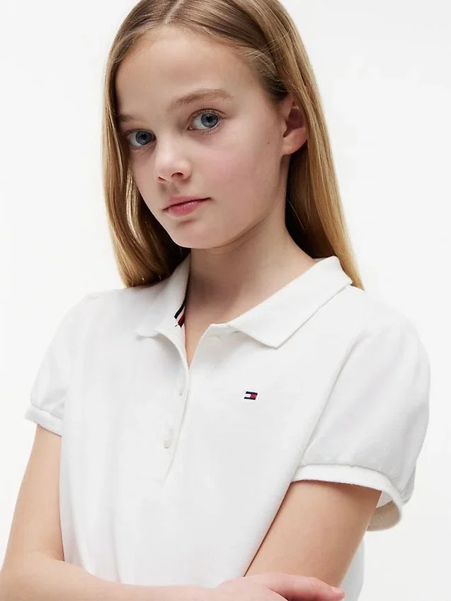 Polo elástico con mangas abullonadas para niña Polo elástico con mangas abullonadas para niña