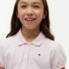 Polo elástico con mangas abullonadas para niña Polo elástico con mangas abullonadas para niña