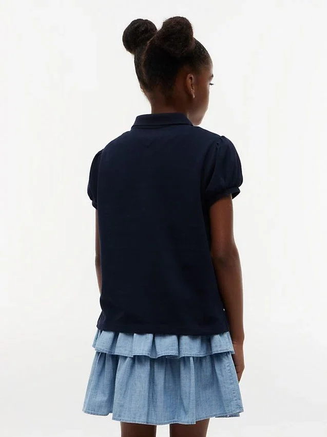 Polo elástico con mangas abullonadas para niña Polo elástico con mangas abullonadas para niña