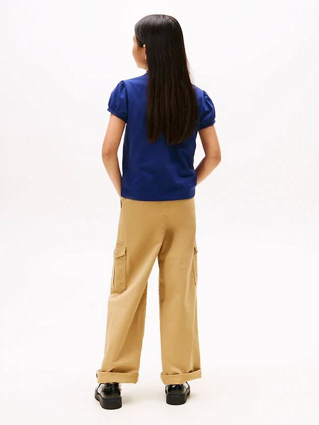 Polo elástico con mangas abullonadas para niña Polo elástico con mangas abullonadas para niña