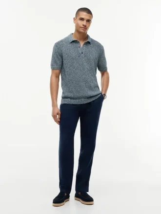 Polo holgado jaspeado de New York Label