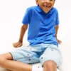 Polo infantil con estampado de banderas