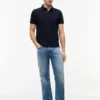 Polo Tommy de corte regular elástico