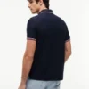 Polo Tommy Wicking de corte regular