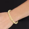 Pulsera de cuentas metálicas Monotype