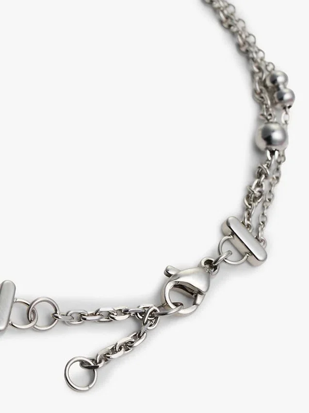 Pulsera de doble vuelta con charm de corazón Pulsera de doble vuelta con charm de corazón