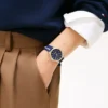 Reloj con correa de rayas emblemáticas de 34 mm Reloj con correa de rayas emblemáticas de 34 mm