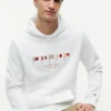 Sudadera con capucha y bandera náutica bordada