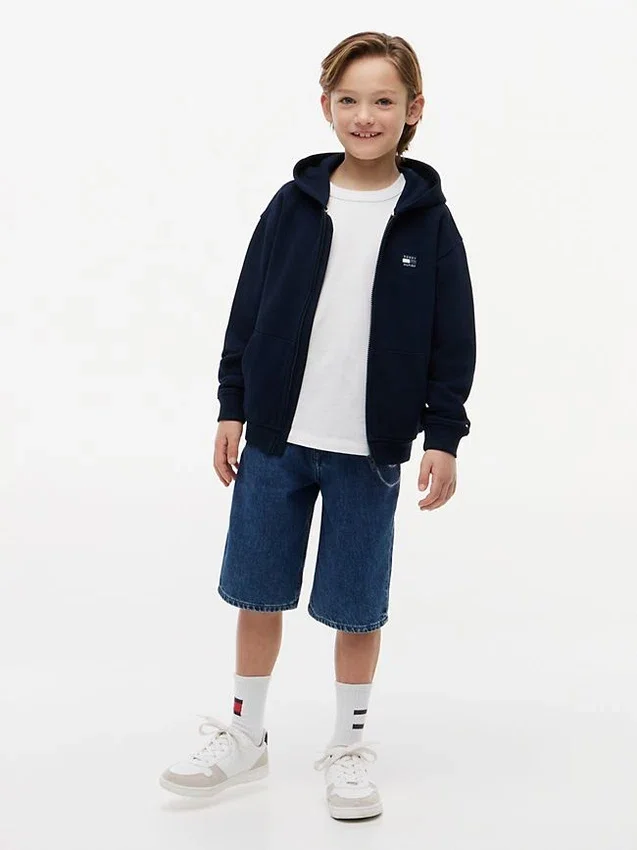 Sudadera con capucha y cremallera para niño con bandera en tonos Sudadera con capucha y cremallera para niño con bandera en tonos