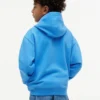 Sudadera con capucha y cremallera para niño con bandera en tonos Sudadera con capucha y cremallera para niño con bandera en tonos