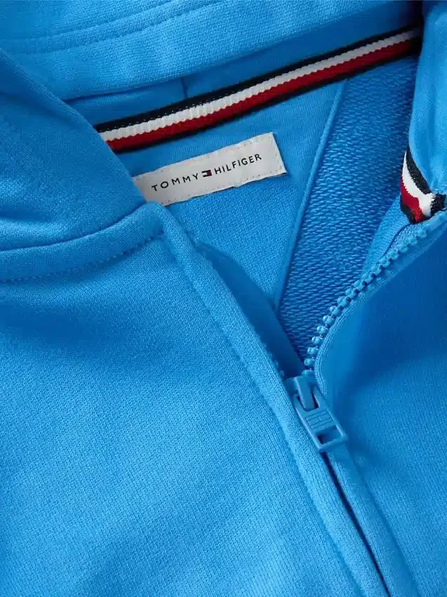 Sudadera con capucha y cremallera para niño con bandera en tonos Sudadera con capucha y cremallera para niño con bandera en tonos