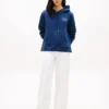 Sudadera con capucha y logo monotipo en tejido jaspeado Sudadera con capucha y logo monotipo en tejido jaspeado
