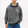 Sudadera con capucha y logotipo pintado con spray de Tommy Jeans