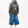 Sudadera con capucha y logotipo pintado con spray de Tommy Jeans