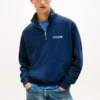 Sudadera con cremallera de un cuarto y logotipo de Tommy Jeans Sudadera con cremallera de un cuarto y logotipo de Tommy Jeans