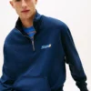 Sudadera con cremallera de un cuarto y logotipo de Tommy Jeans Sudadera con cremallera de un cuarto y logotipo de Tommy Jeans