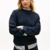 Sudadera de punto interlock con botones dorados