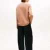 Sudadera de punto interlock con botones dorados