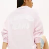 Sudadera holgada con estampado de pompones de Tommy Jeans