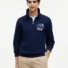 Sudadera polo con logo floral y cremallera de un cuarto