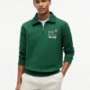 Sudadera polo con logo floral y cremallera de un cuarto Sudadera polo con logo floral y cremallera de un cuarto