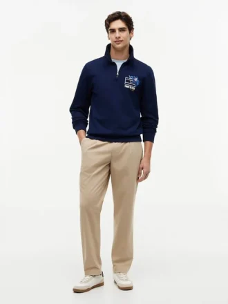 Sudadera polo con logo floral y cremallera de un cuarto